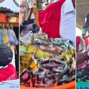 NAFDAC officials conducting enforcement operations to seize banned sachet alcohol and small PET bottle alcoholic drinks at a market in Nigeria.