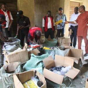 NAFDAC enforcement officers uncover suspected counterfeit drinks and packaging materials at a facility in Lagos Trade Fair Complex.