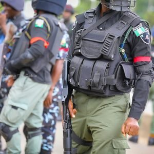 FCT Commissioner of Police Ahmed Sanusi inspects personnel of the newly launched Violent Crime Response Unit during its inauguration in Abuja.