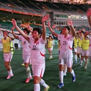 North Korean and South Korean women’s football players during their 1-1 Asian Games match in Shizuoka, Japan.