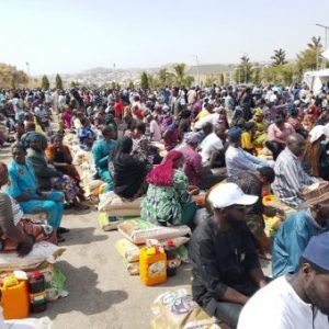 Officials distribute bags of rice, beans and relief supplies to victims of the recent attack in Bassa, Plateau State.