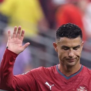 Cristiano Ronaldo waves to Portugal supporters after the team's 1-0 defeat to Spain in the 2026 FIFA World Cup Round of 16 match in Texas.