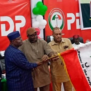 Senator Sandy Onor receives PDP flag after emerging as the party’s consensus presidential candidate for the 2027 election in Abuja.