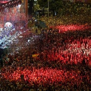 Spain's World Cup-winning players celebrate with the trophy during a victory parade at Cibeles Square in Madrid after defeating Argentina in the 2026 FIFA World Cup final.