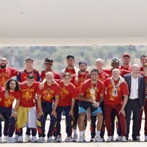 Spain captain Rodri lifts the FIFA World Cup trophy as Spain's national team arrives in Madrid after winning the 2026 World Cup.