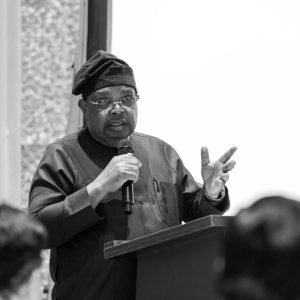 Power Minister Joseph Tegbe speaks at the commissioning of a 3MW hybrid mini-grid at Yakubu Gowon University, Abuja.