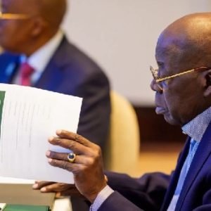 President Bola Tinubu and presidential aide Bayo Onanuga during Tinubu's working vacation abroad.