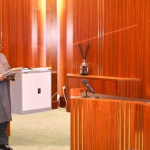 President Bola Tinubu administering oath of office to Joseph Tegbe and Sola Enikanolaiye at the Presidential Villa in Abuja during ministerial swearing-in ceremony.