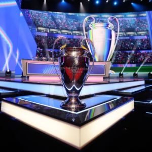 UEFA Champions League trophy displayed during the 2026/27 league-phase draw in Monaco.