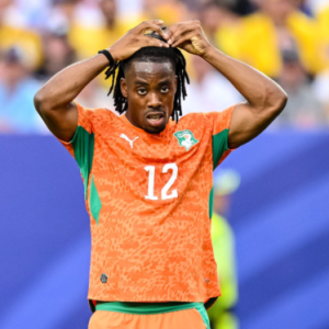 Ivory Coast striker Elye Wahi in action during a World Cup match, amid visa denial linked to a French match-fixing investigation.