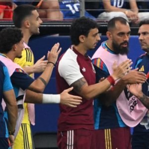 Spain players celebrate after defeating France 2-0 in the 2026 FIFA World Cup semi-final at AT&T Stadium in Arlington, Texas.