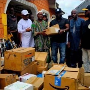 City Boy Movement officials donating medical supplies and cash to Esiele community in Oyo State after school abduction incident.