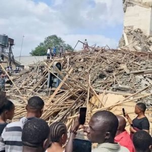 Rescue workers and emergency responders search through the rubble of a collapsed building under construction on Odili Road in Port Harcourt, Rivers State, after one person died and three others were rescued.