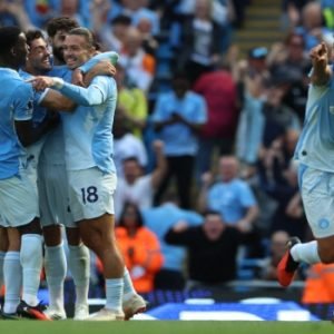 Manchester City players celebrate after Josko Gvardiol scores the late winning goal against Bournemouth at the Etihad Stadium.