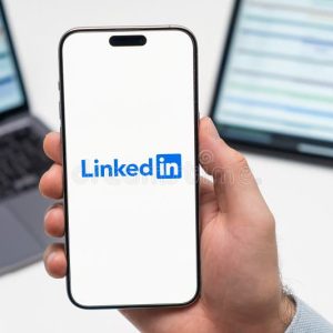 LinkedIn logo on smartphone screen representing data privacy complaint in Austria