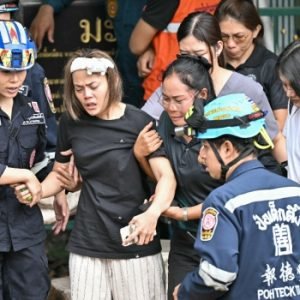 Police and emergency responders outside Debsirin Nonthaburi School after a deadly school shooting in Nonthaburi province, Thailand.